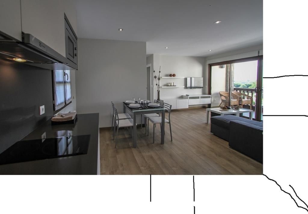 Apartamentos Andrín Cameră foto